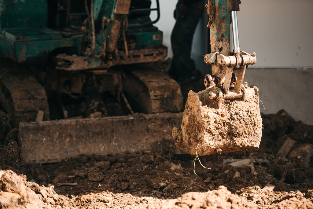 close-up-worker-backhoe-working-construction-site.jpg